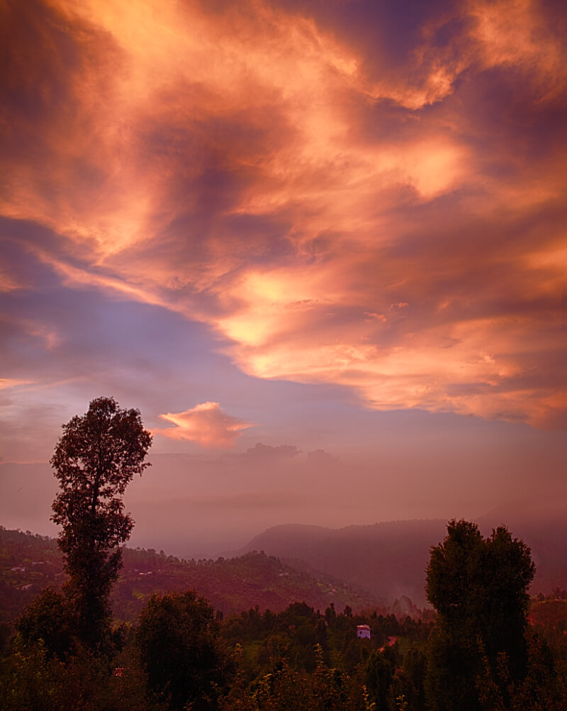Sunset in front of Maini's Hill Cottages