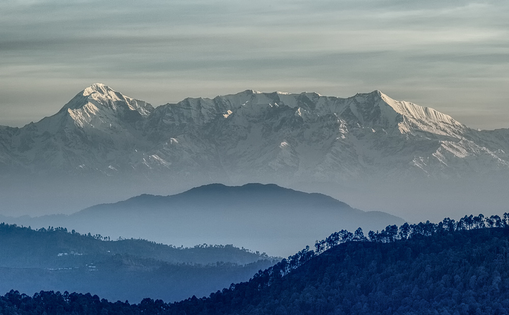 Morning light on snow peaks