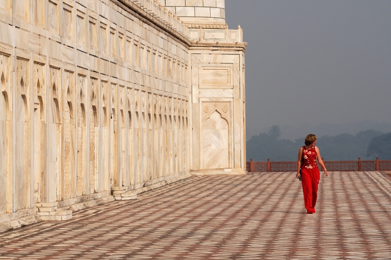 Tourist in red at Taj Mahal