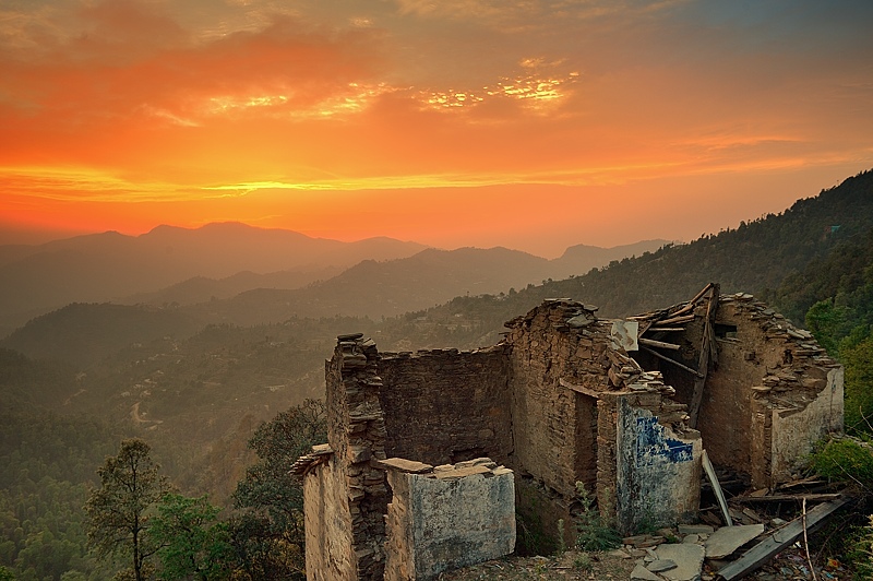 Broken house and sunset